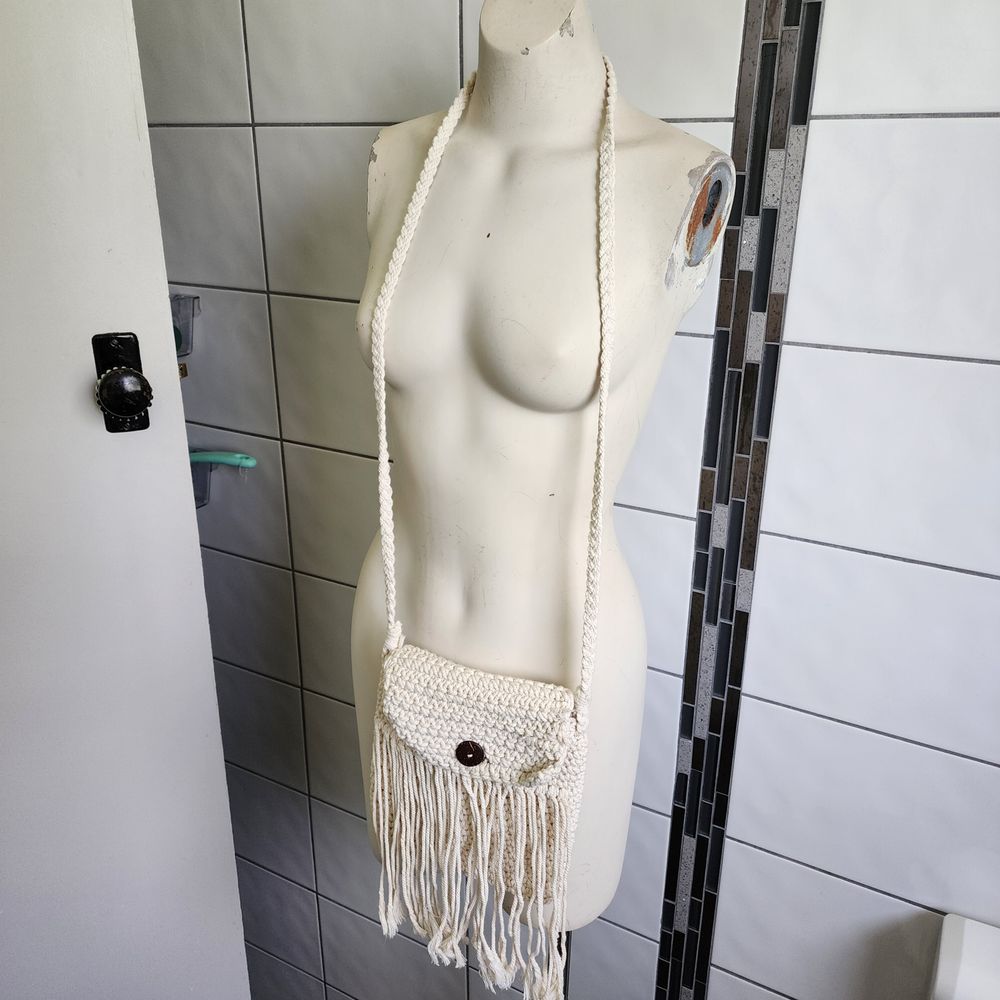 Cream cross body bag