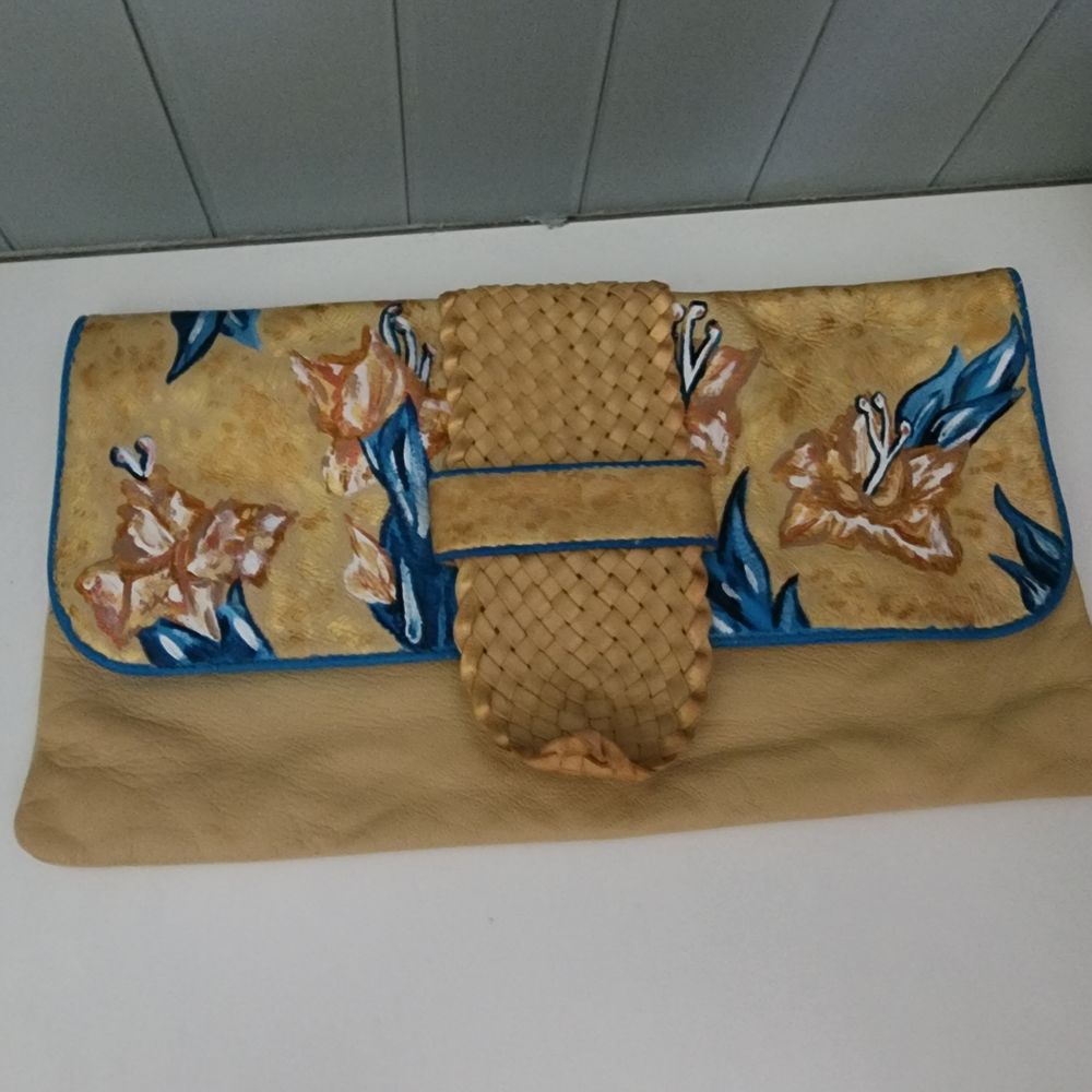 Painted leather clutch