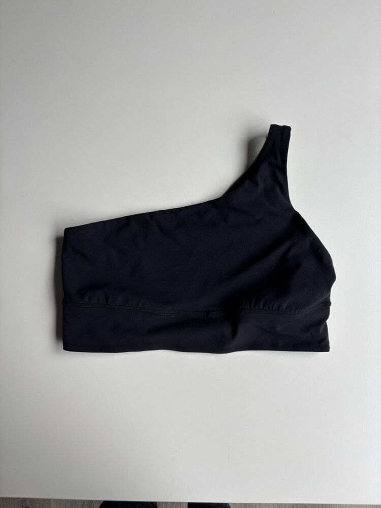 Lululemon black one shoulder top. Size Lulu 12 / L