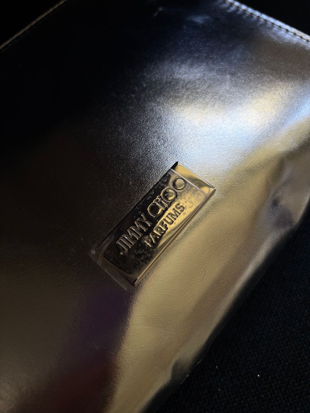 Jimmy Choo Silver Parfume Clutch Bag