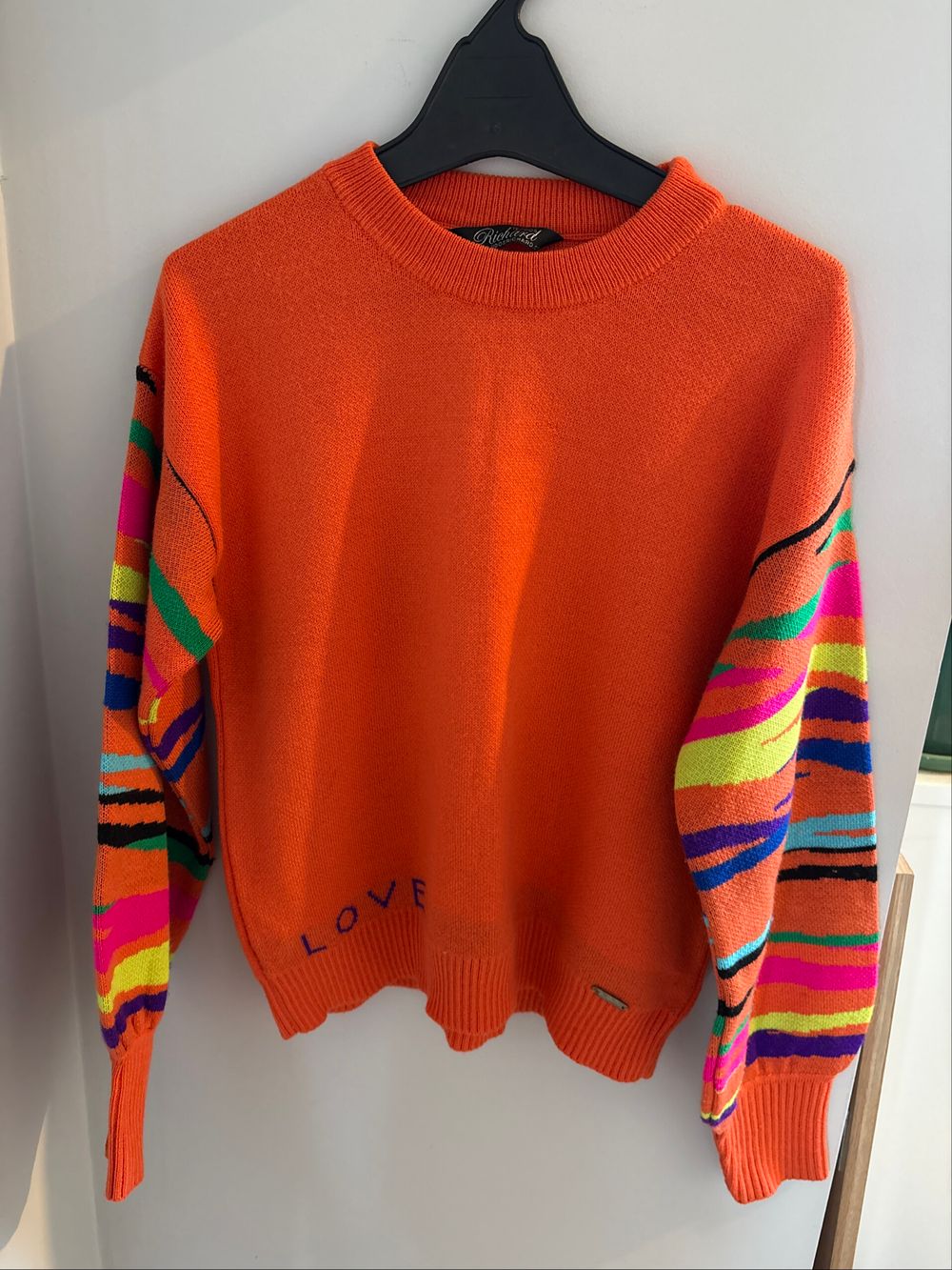 Orange Knit Jumper with Colourful Sleeves