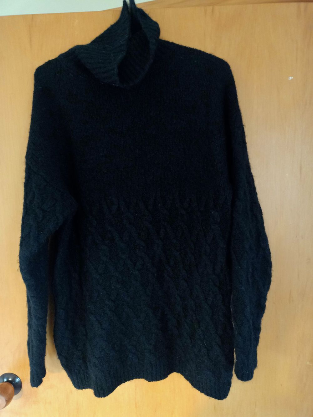 Black cable turtle neck jumper