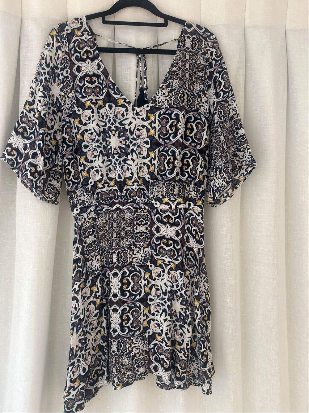 Short Dress With Low Back Details