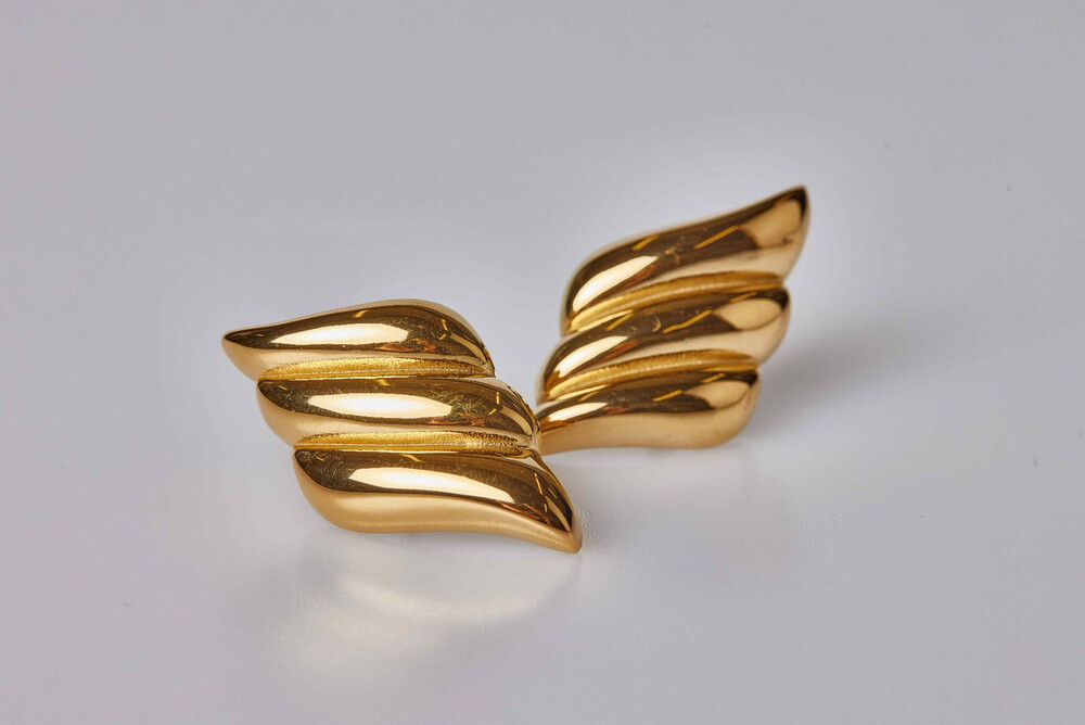 ✨ 18 K Gold wing statement earrings ✨  RRP $75  Ride the waves of sophistication with Wave Earrings—a bold statement piece adorned with captivating swirls that elevate every outfit.   Designed to make a lasting impression, these earrings bring a dynamic t