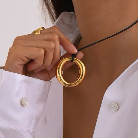 ✨ Beautiful gold 90s pendant on a black cord necklace  Heaven May hem inspired  RRP $75 Adjustable length  18k gold filled stainless steel waterproof tarnish free hypoallergenic never color the skin or fade