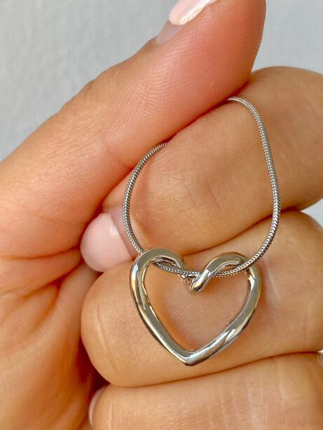 ✨Gorgeous silver love retro necklace  Y2k #90s vibe 40 cm + 5 cm adjustable  Material: silver filled stainless steel  Stainless steel is waterproof tarnish free hypoallergenic never color the skin or fade  If it was just silver it would tarnish with time