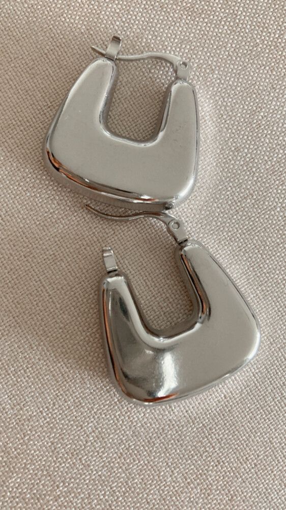 ✨ Silver Chunky Minimal Hoops – Stainless Steel ✨  Sleek, sculptural, and feather-light – these silver-filled stainless steel hoops are the ultimate life-proof accessory.  Waterproof, tarnish-free, an