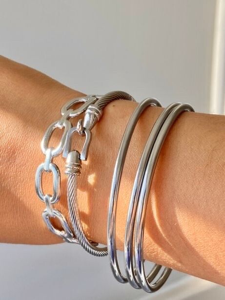 ✨ 1 silver stainless steel bracelets  Brand new Beach and swimming friendly  17,5 cm diameter  3 mm width   Price is for 3 together.  Silver filled stainless steel means it’s waterproof tarnish free hypoallergenic never color the skin or fade . 100% n