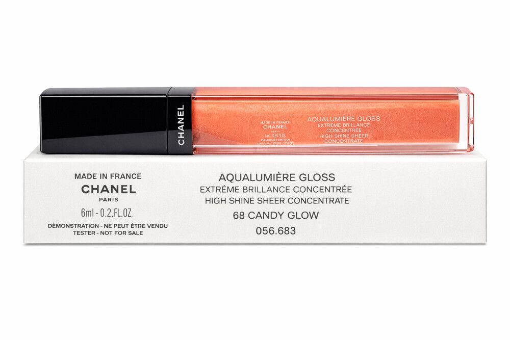 ✨ Chanel Aqualumière Gloss 68 Candy Glow ✨  Brand new, unused Chanel Aqualumière Gloss in the stunning shade 68 Candy Glow — a soft peachy nude with luminous, glass-like shine. This formula delivers a sheer, high-shine finish that enhances your natural li