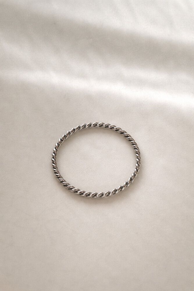 ✨ Twisted Silver Ring size 6 waterproof ✨  This sleek twisted band is crafted from high-quality silver-filled stainless steel, giving you that clean, polished silver look with long-lasting durability. Designed to be waterproof, tarnish-free, an