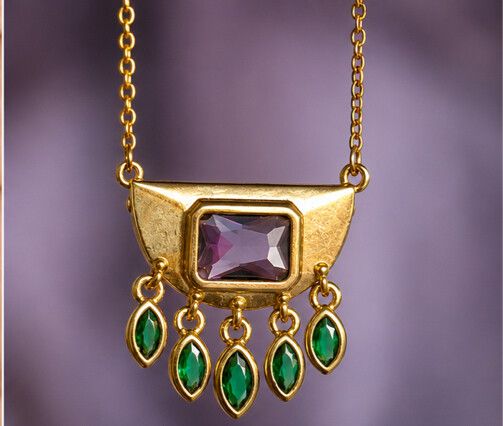 ✨ Amethyst & Green Zircon Crescent Necklace ✨  Giving major By Charlotte-inspired vibes, this dreamy crescent necklace blends celestial energy with everyday elegance. Featuring a genuine amethyst centre stone surrounded by deep green zircon accents, it cr
