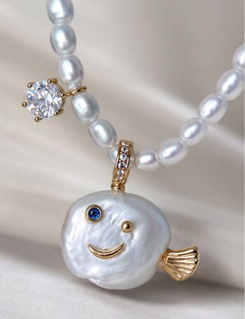 ✨ Smiley Fish Freshwater Pearl Necklace ✨  The cutest pearl necklace for anyone who loves unique jewellery with meaning. Made with genuine freshwater pearls, a sparkling clear zircon, and a tiny blue zircon fish eye, this piece blends playful charm with s
