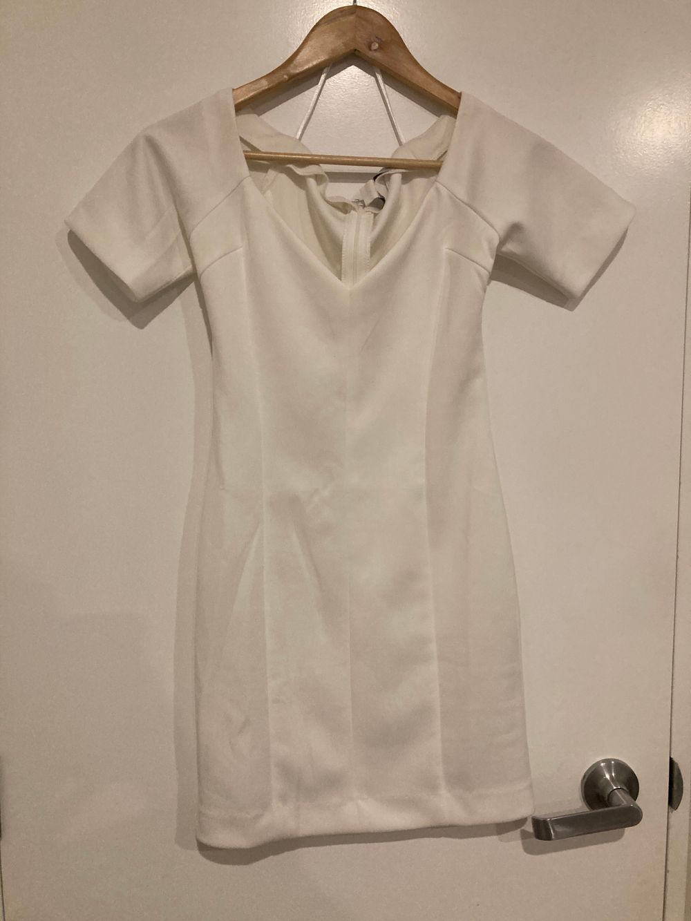 Chic white sleeved mini dress