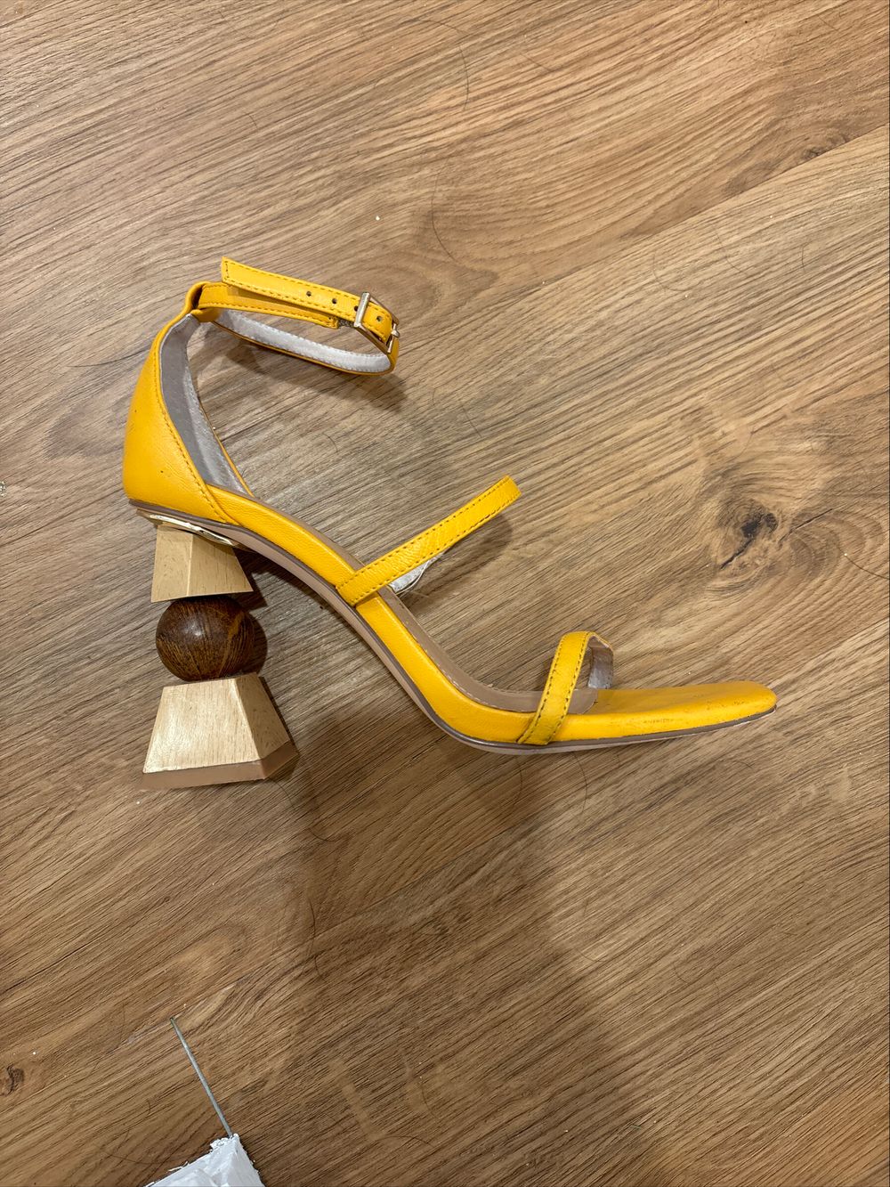 Yellow heels with wooden statement heel