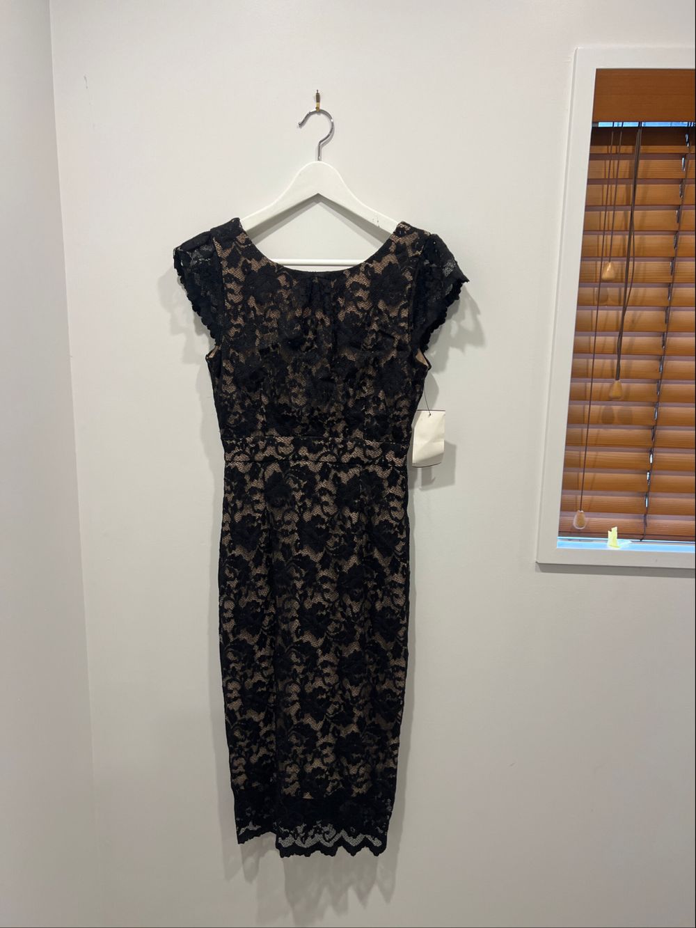 Black lace dress with lining.