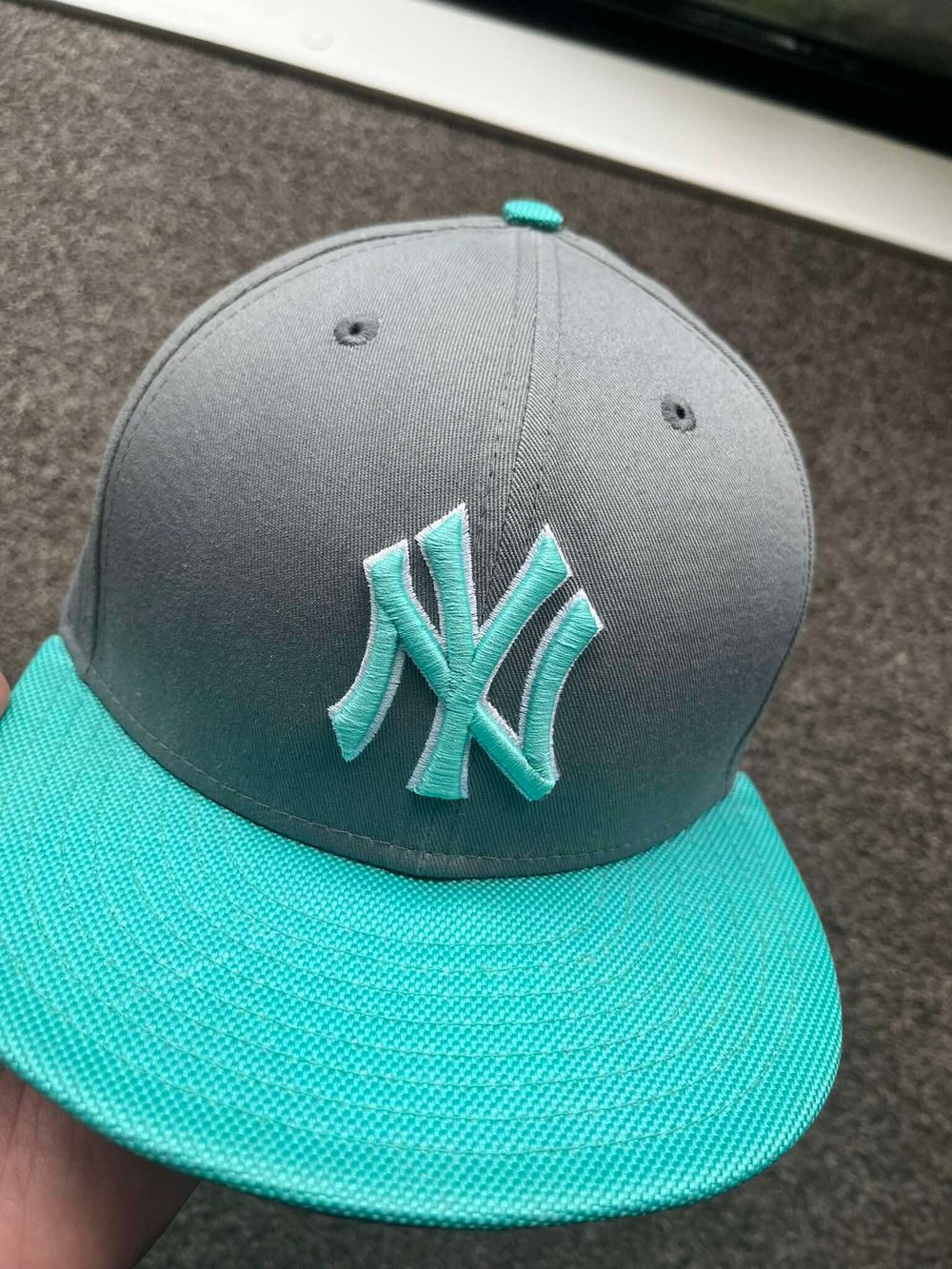 New Era New York Yankees cap with teal adjustable strap
