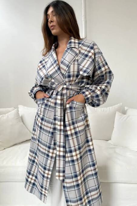 Caitlin crisp in The loop Coat