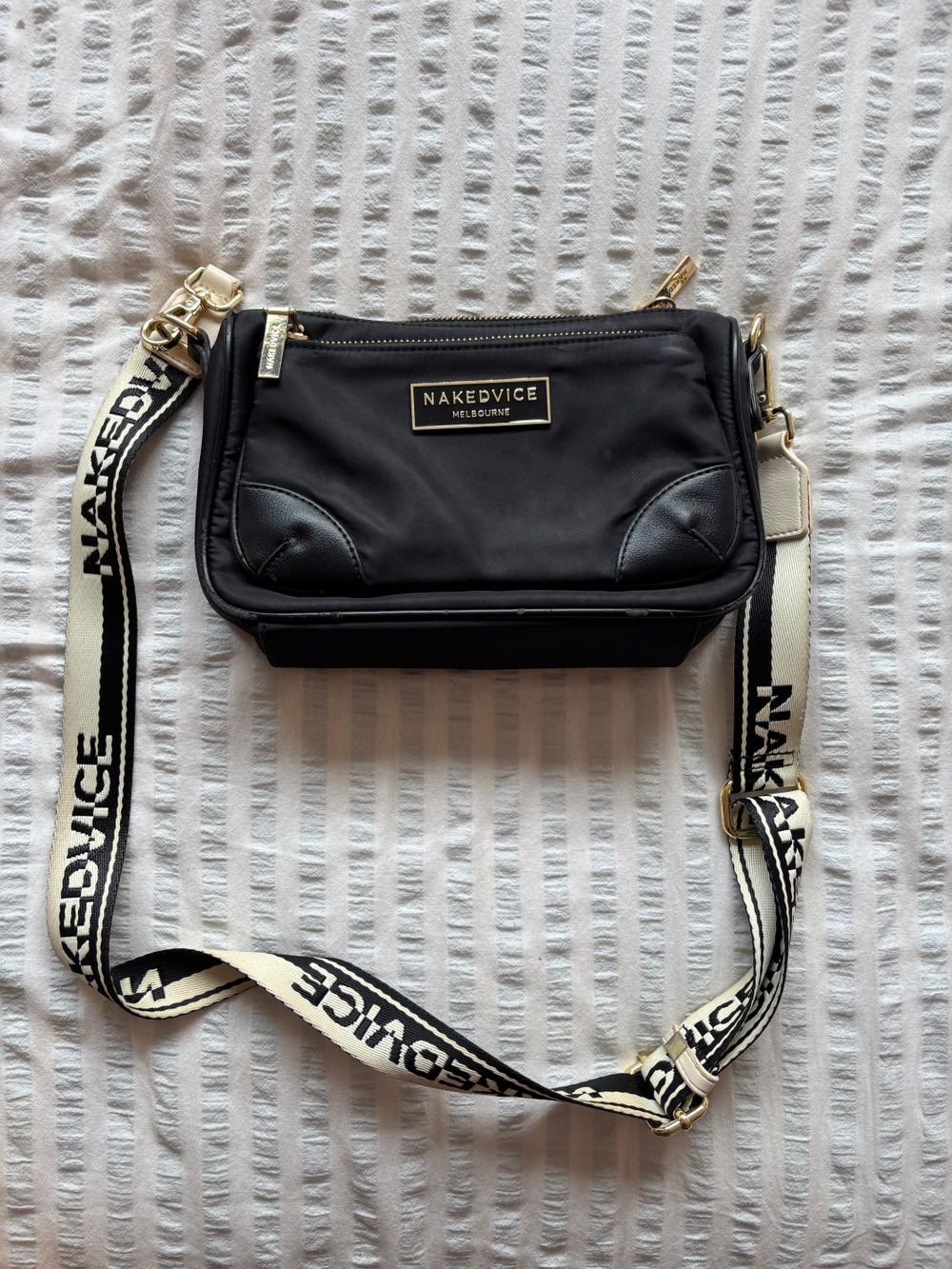 Naked vice cross body