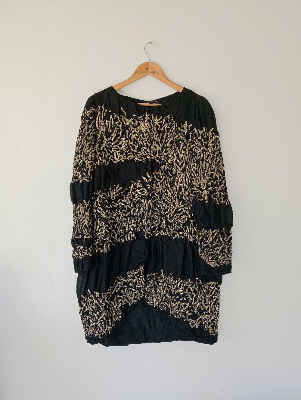 High-end designer silk coat or dress with gold embellishment