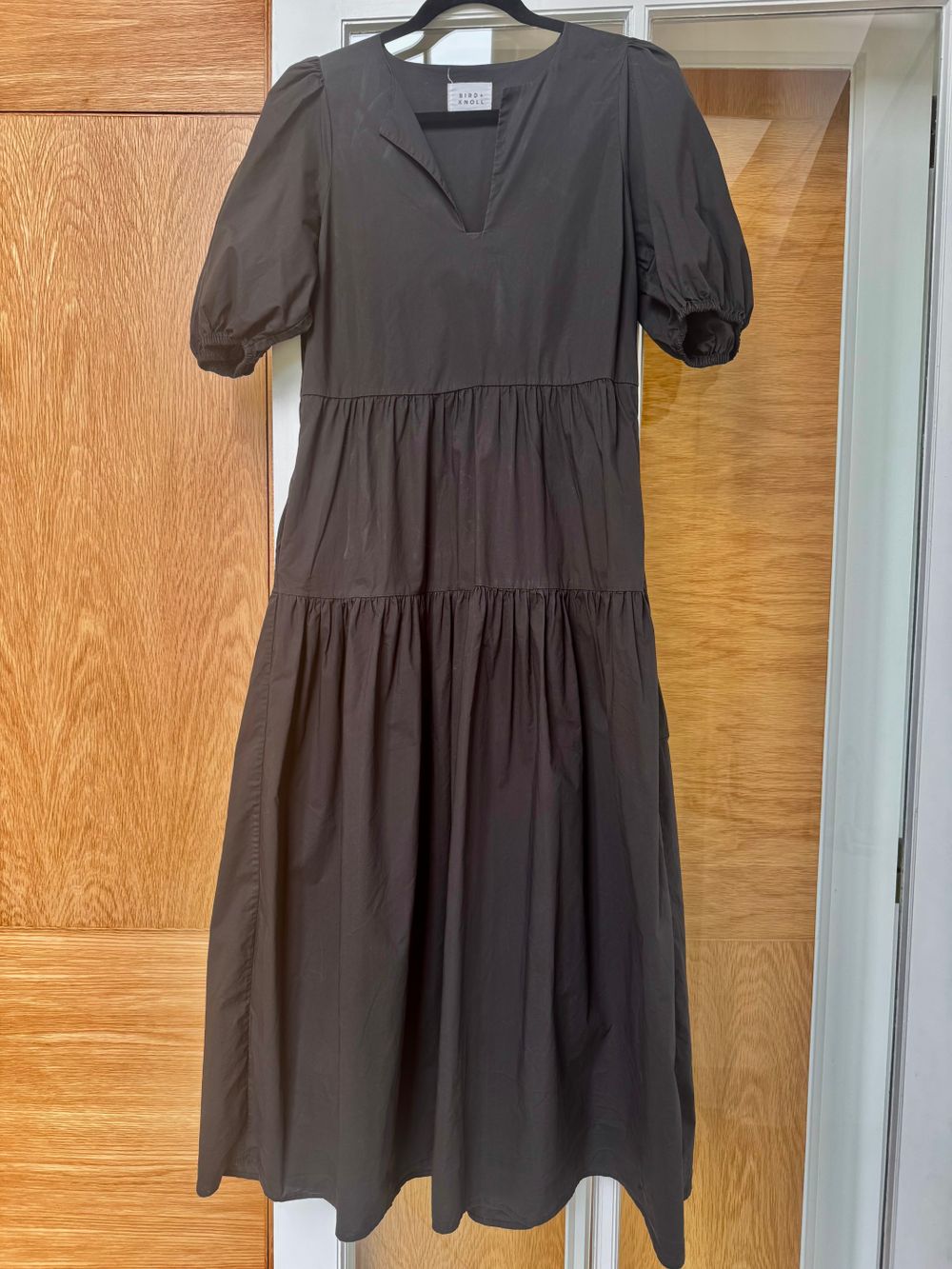 black tiered cotton midi dress with pockets