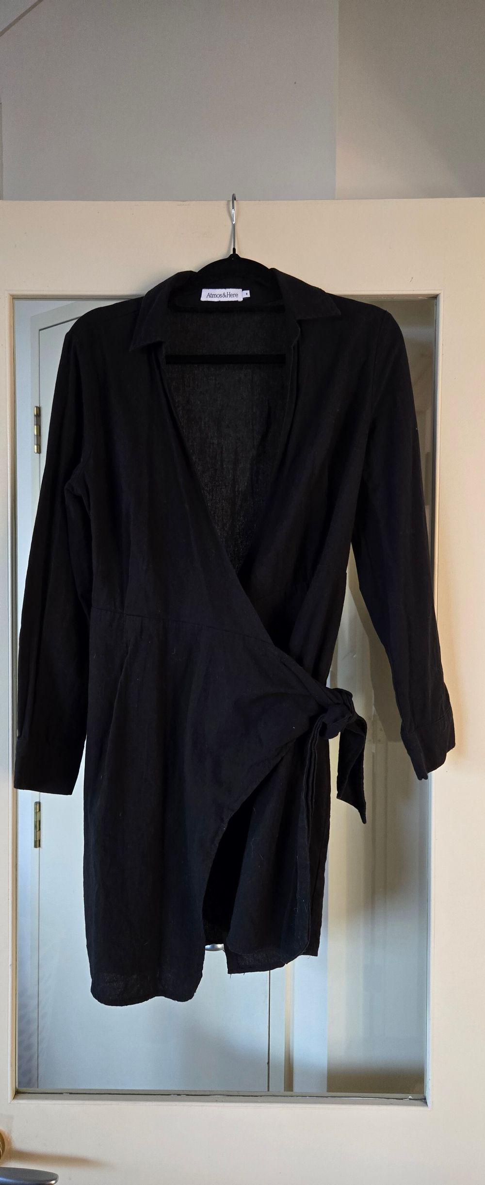 Atmos&Here black long-sleeve wrap dress with tie waist and button cuffs