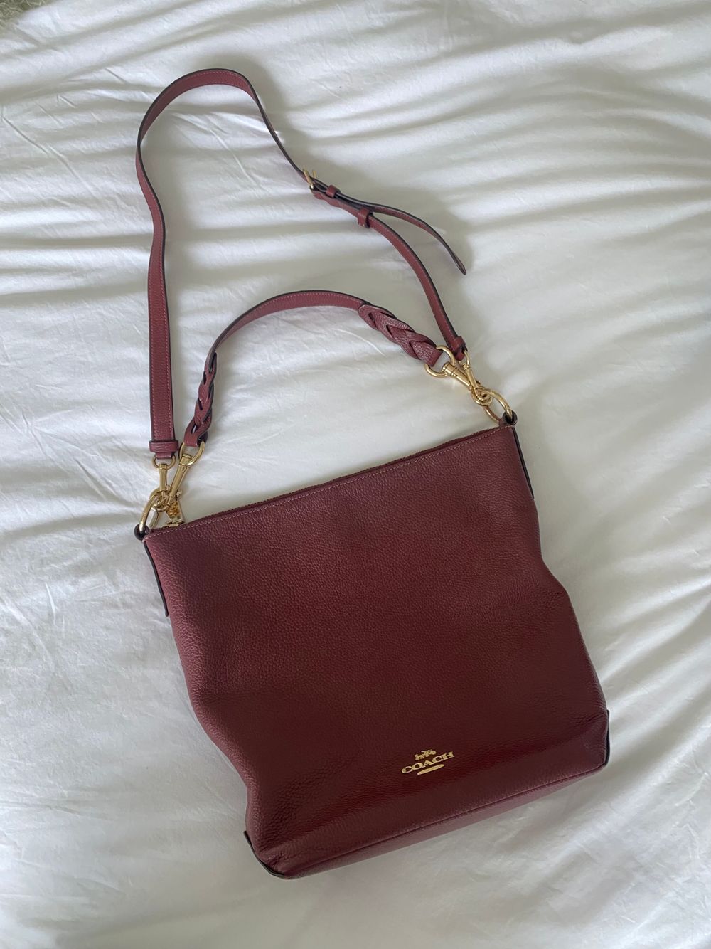 Coach burgundy leather cross-body handbag