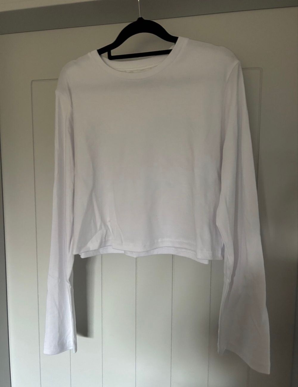 Caitlin crisp CC club White Long Sleeve Cropped Top