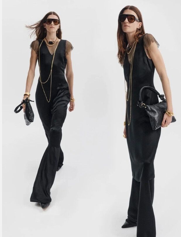 HUSK Black Flare pants Size 16 Glam Wide leg Casual Dressy Designer Minimalistic