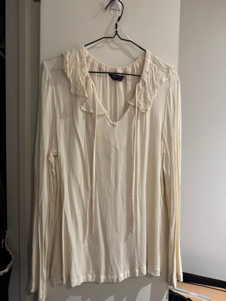 White frilly top