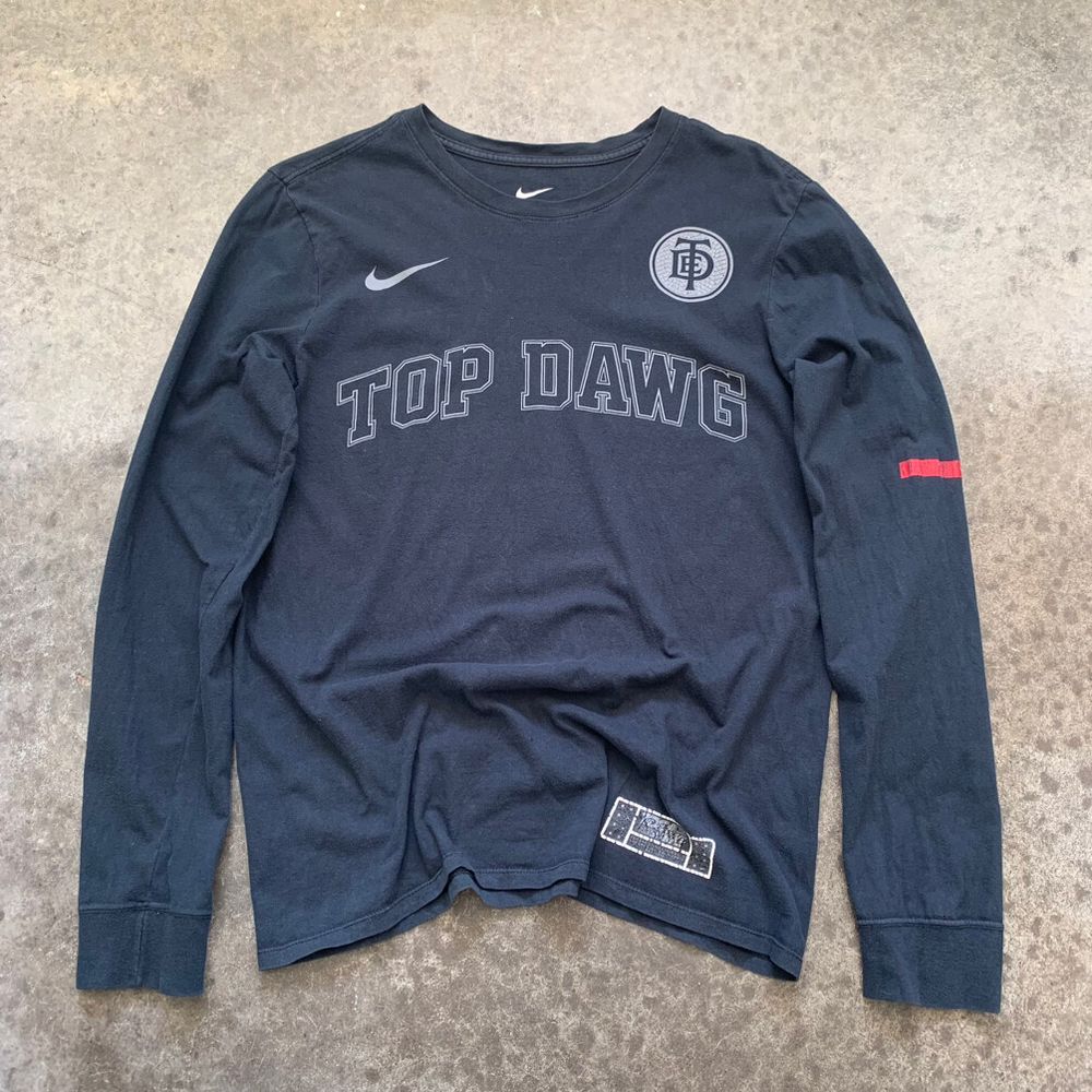 tde x nike crest logo