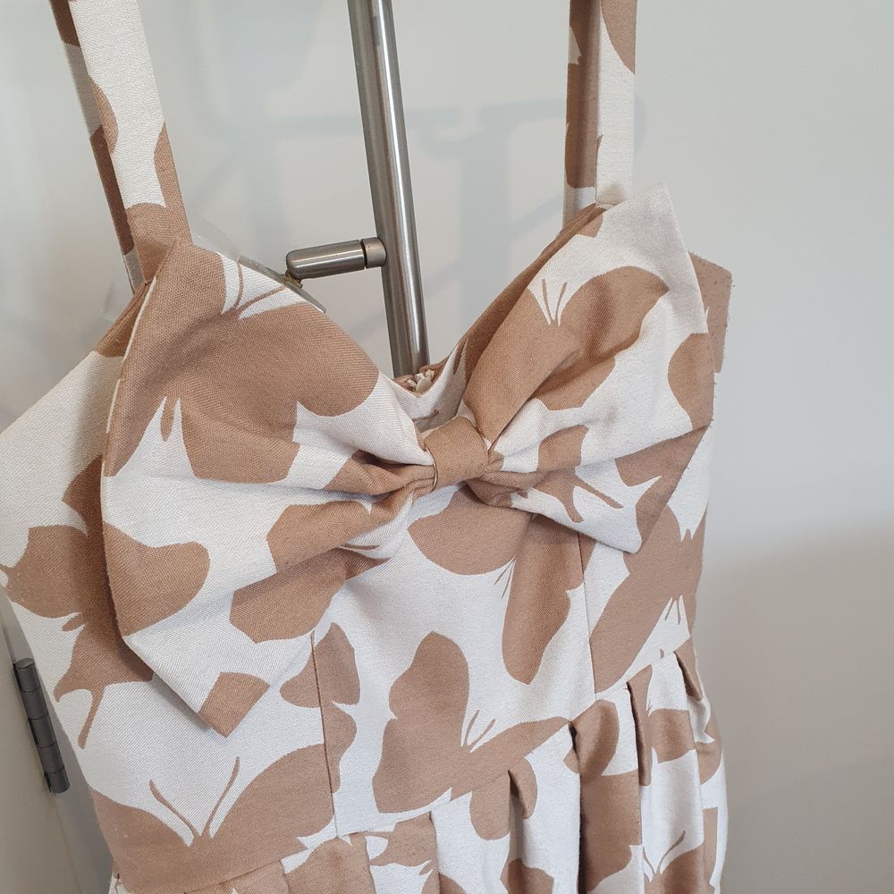 All a flutter Butterfly kisses dress