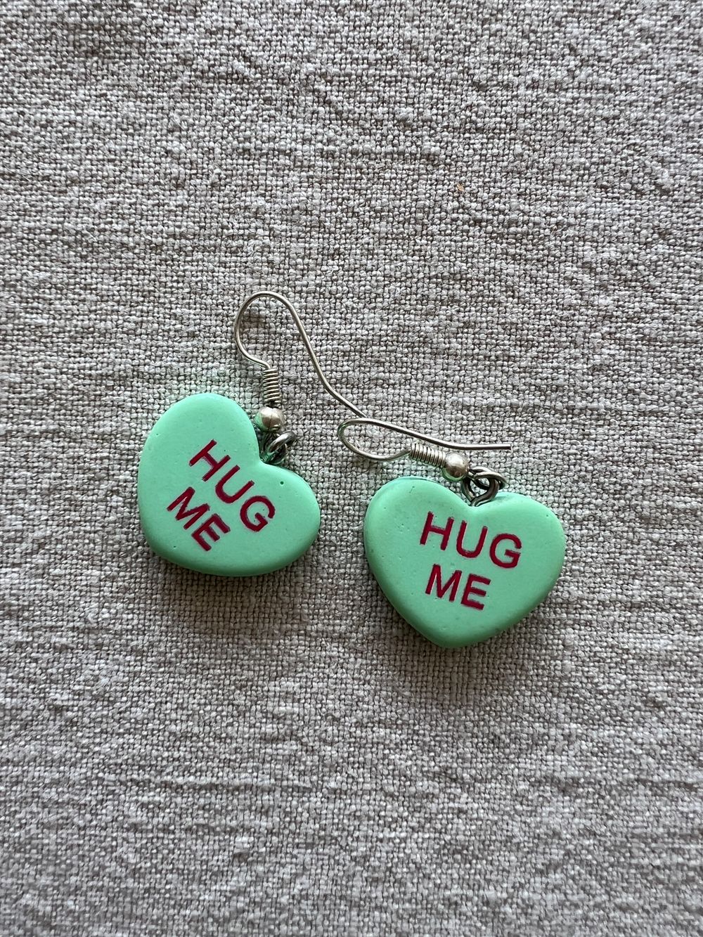 Cute love heart 'hug me' earrings