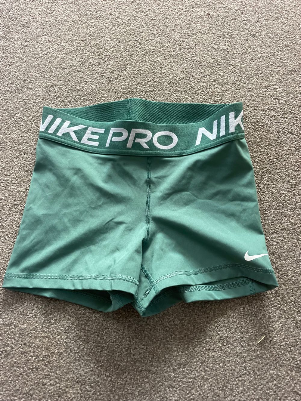 green nike compression shorts