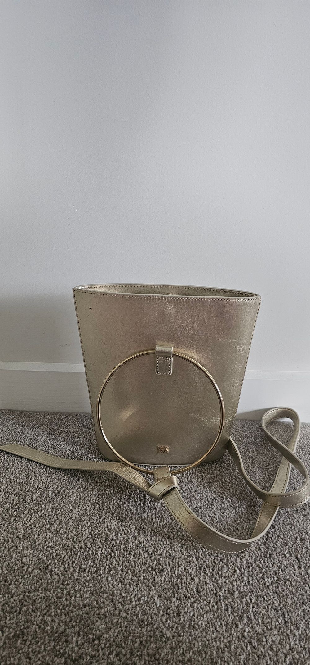 Gold crossbody bucket bag