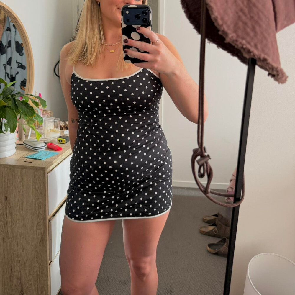 novara mini dress in black with black bows Novara Mini Dress in Black with Black Bows