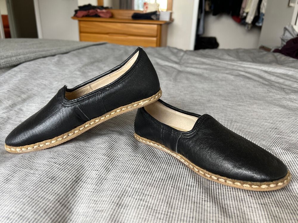 Black leather slip on shoes