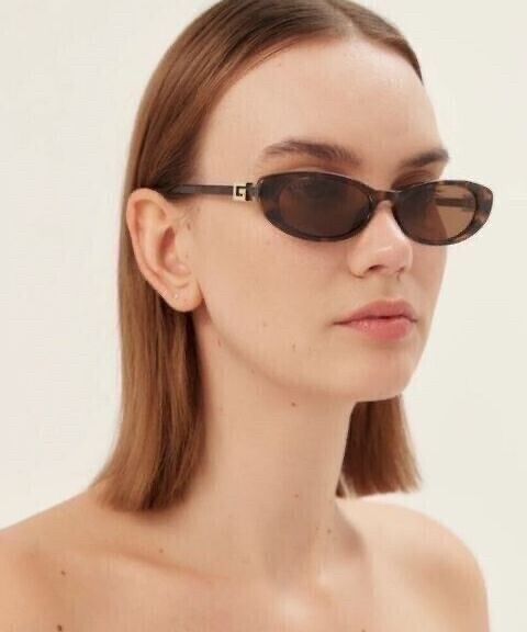Gucci Brown oval cat eye Sunglasses