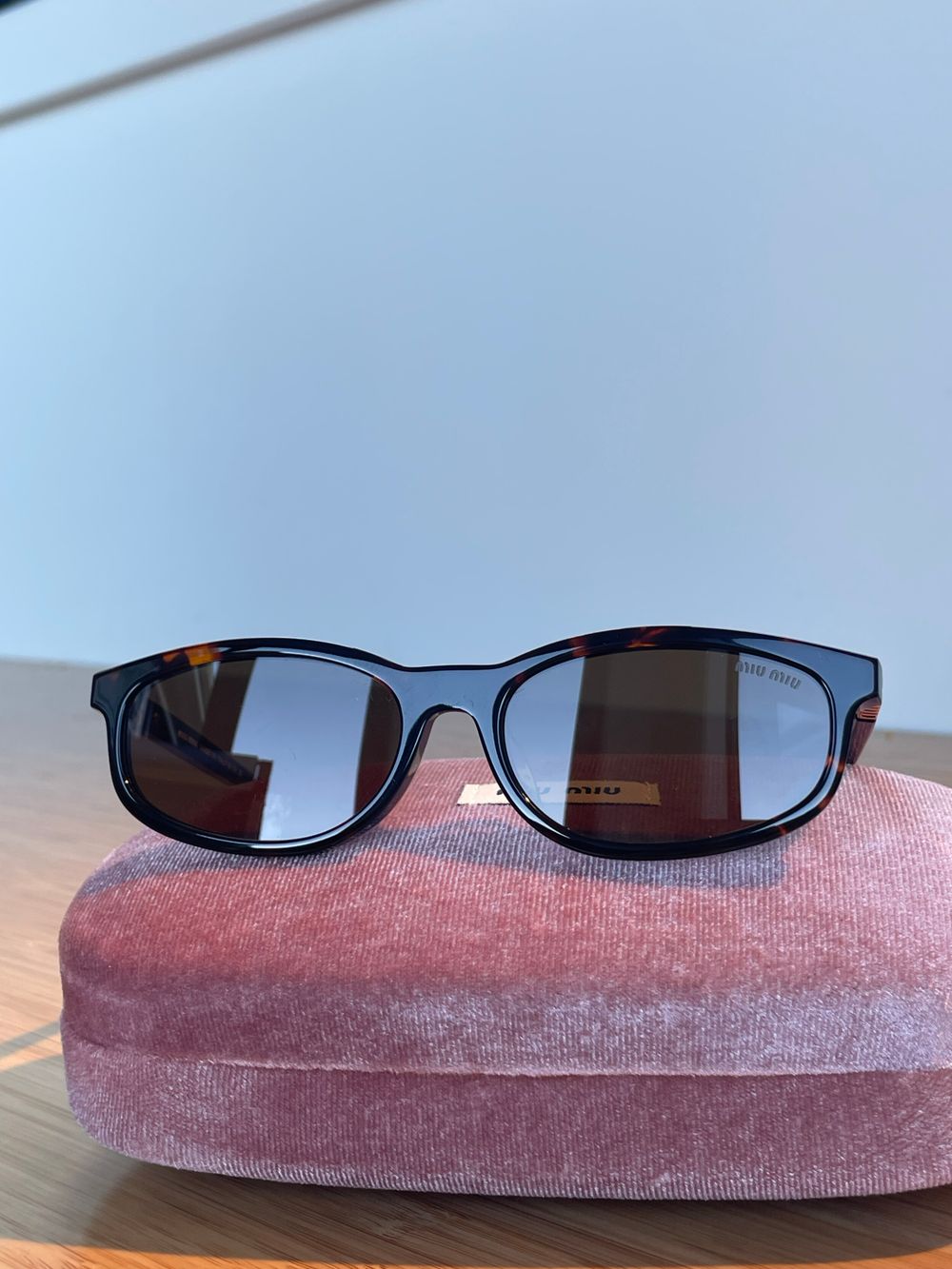 Miu Miu MU A06S