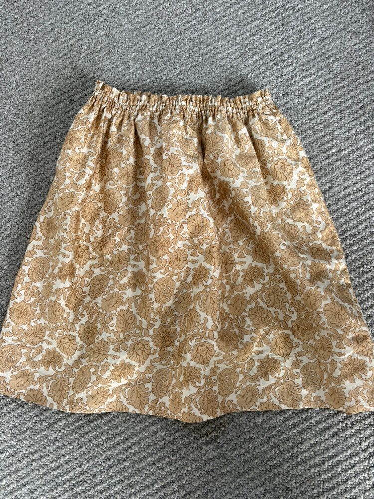 Karen Walker Beige Patterned Skirt, fit size 8-12.