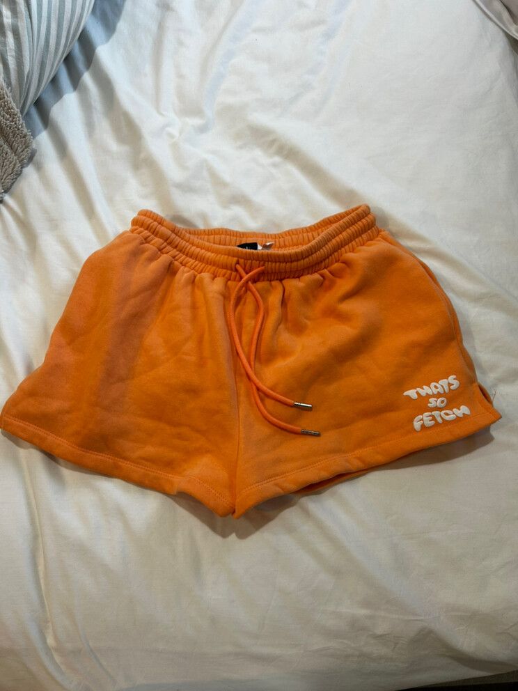 That’s so fetch orange sweat shorts
