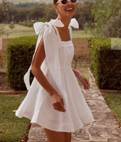 knee length dresses for ladies Aisle Linen Bow Dress  Your Designer Rentals