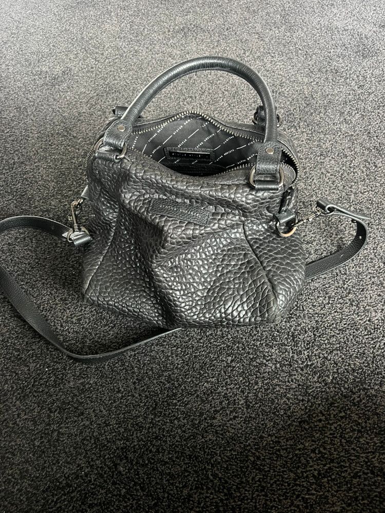 status anxiety last mountain black bubble leather handbag
