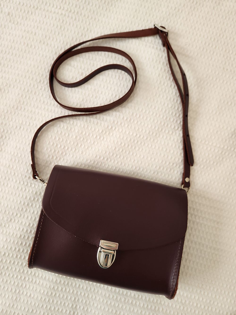 The Cambridge Satchel Company leather bag in plum wine colour