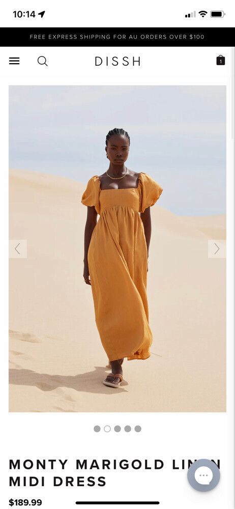 dissh orange dress Muse @emerson_gibbs wears the Gia Tangerine Linen Dress.  Featuring a  strapless neckline, flowing skirt and side pockets.  Shop the limited  style online now. #DISSH