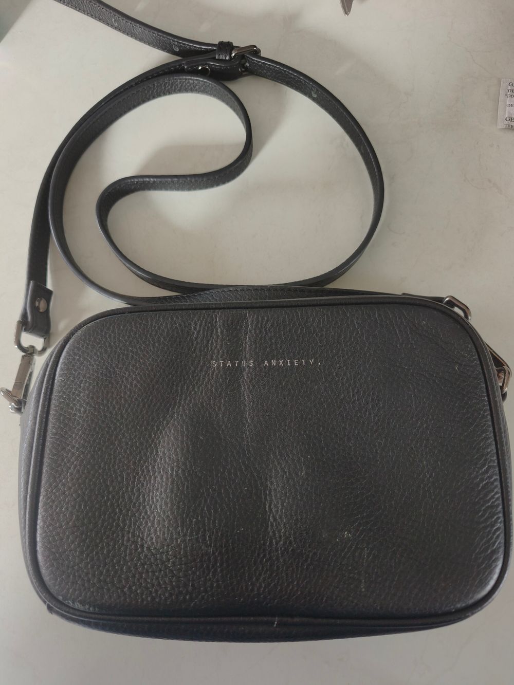Status Anxiety Black Plunger Crossbody Bag