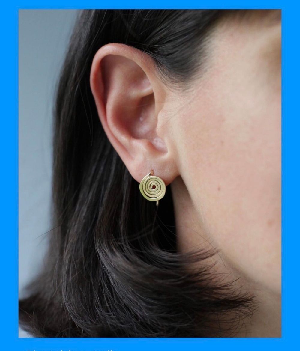 Fixed Air hand forged brass spiral earrings.