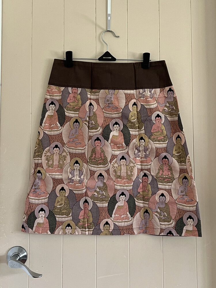 Buddha print knee-length skirt