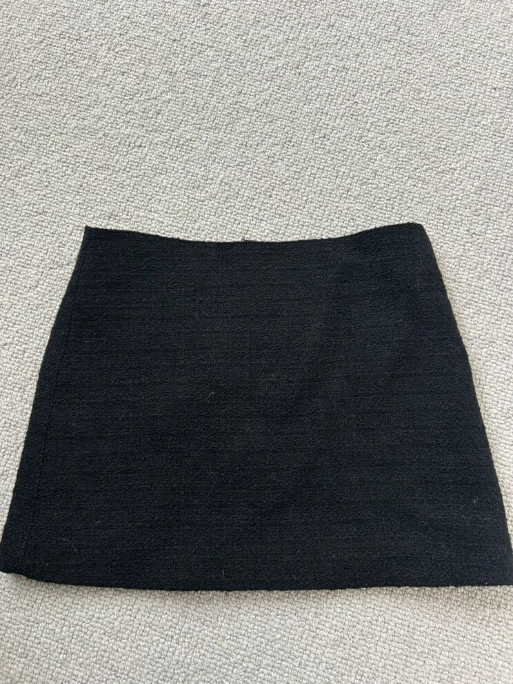 supprette black mini skirt