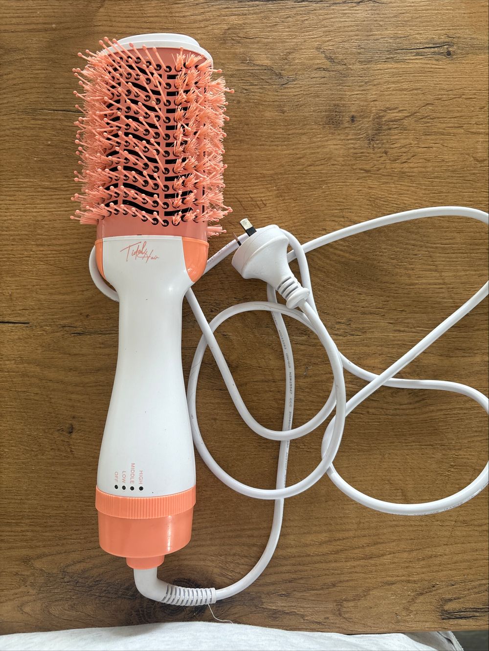 Tidal hair brush