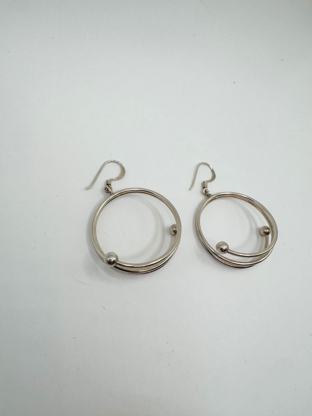 Silver Spiral Hoop earrings. 25mm diameter. 8 grams